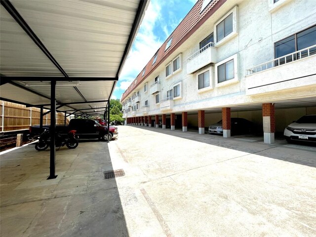 exterior space featuring a carport