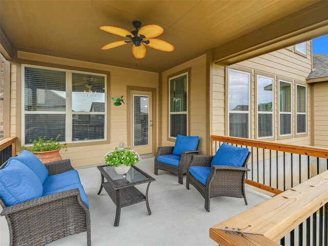 exterior space with an outdoor hangout area and ceiling fan