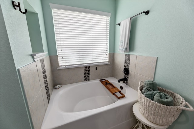 bathroom featuring a bathing tub