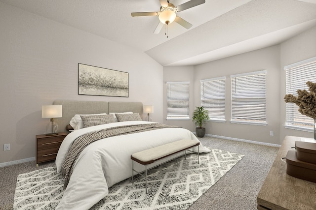 bedroom featuring ceiling fan, carpet flooring, and lofted ceiling