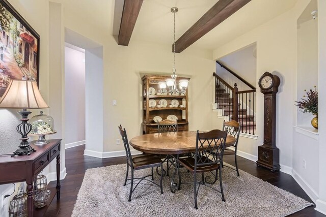 dining space with a chandelier, dark hardwood / wood-style flooring, and beamed ceiling