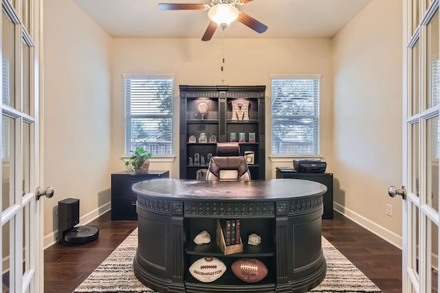 office area featuring dark wood-style floors, baseboards, a ceiling fan, and french doors