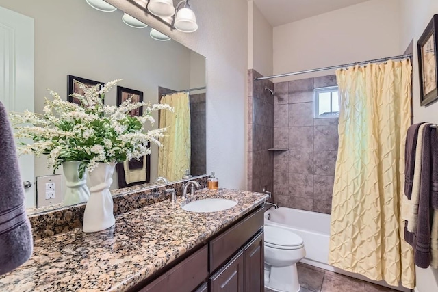 full bathroom with vanity, shower / bath combo, tile patterned flooring, and toilet