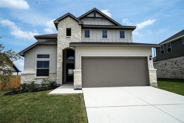 view of front facade with a front lawn and a garage