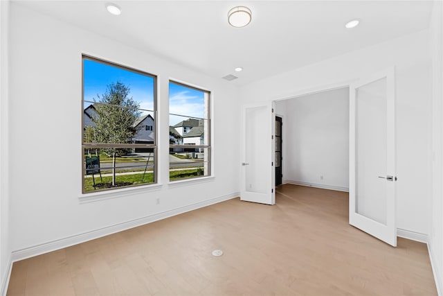 unfurnished bedroom with light hardwood / wood-style flooring