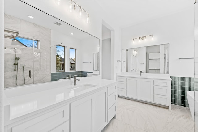 bathroom with plus walk in shower and vanity