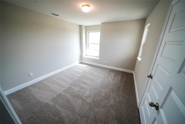 view of carpeted spare room