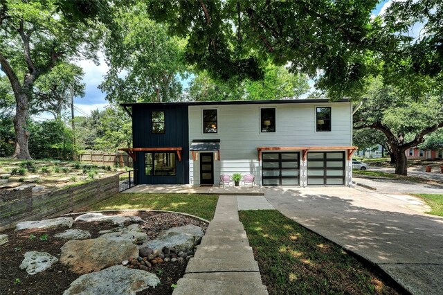 3104 Santa Monica Dr, Austin, TX 78741 - contemporary home with a garage and concrete driveway