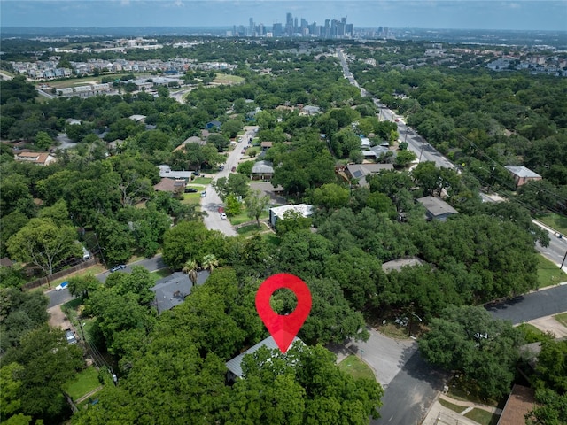 birds eye view of property featuring a city view