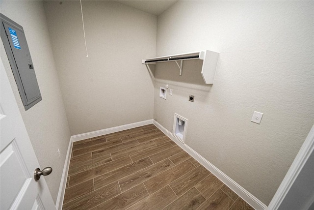 213 Fillmore Fls, Cibolo, TX 78108 - laundry area featuring electric panel, hookup for an electric dryer, dark wood finished floors, baseboards, and hookup for a washing machine