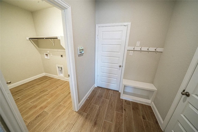 213 Fillmore Fls, Cibolo, TX 78108 - laundry area featuring hookup for an electric dryer, wood finished floors, washer hookup, and baseboards