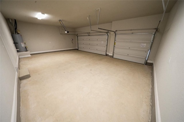 213 Fillmore Fls, Cibolo, TX 78108 - garage featuring baseboards and water heater