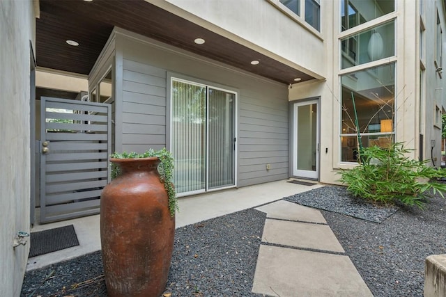 doorway to property with a patio area