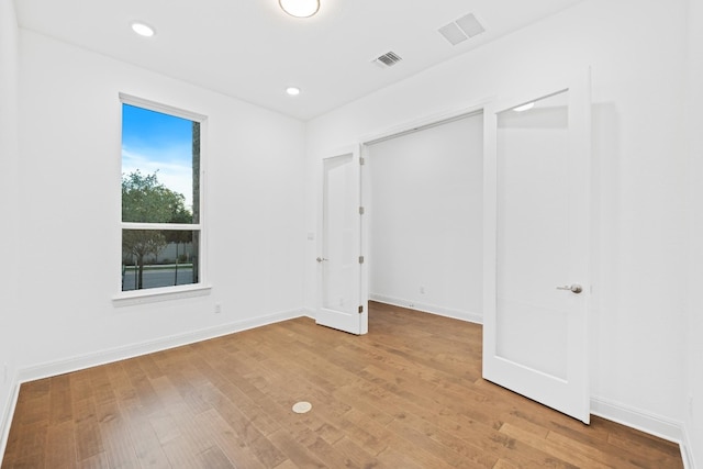 unfurnished bedroom featuring light hardwood / wood-style flooring