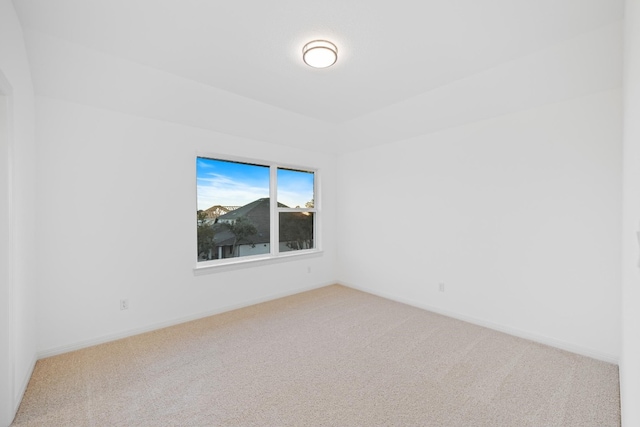 unfurnished room with carpet floors