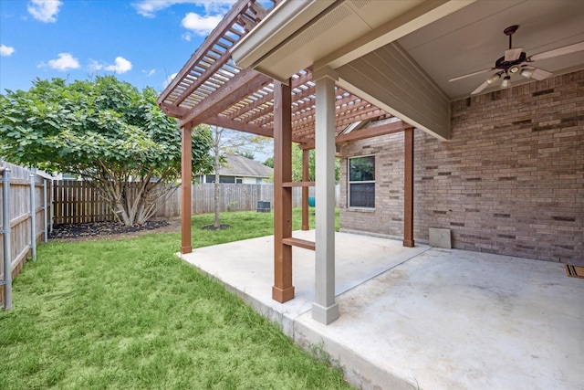 view of patio / terrace with a pergola and ceiling fan