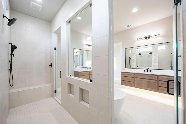 bathroom with vanity, plus walk in shower, and tile patterned floors