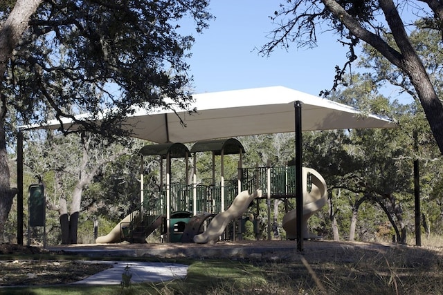 view of home's community featuring a playground