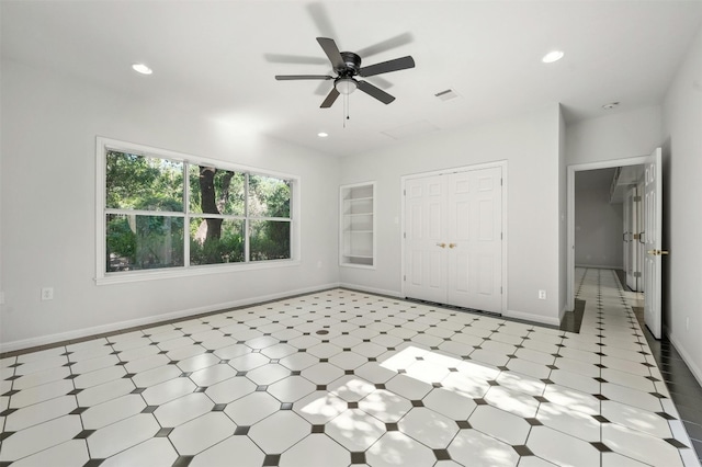 interior space with a closet and ceiling fan