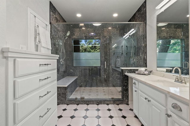 bathroom featuring vanity and walk in shower