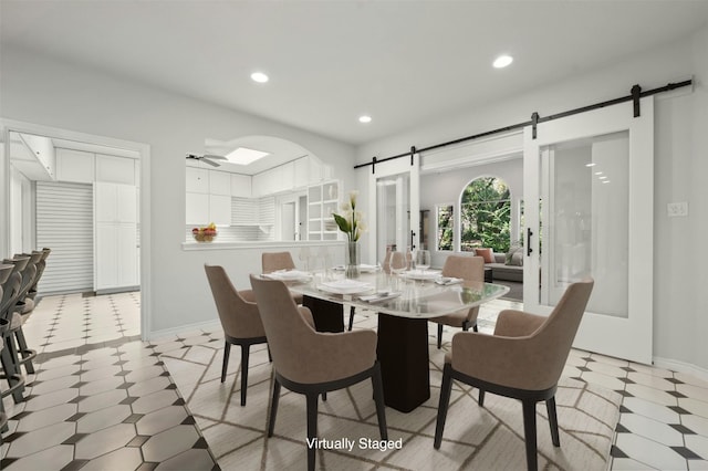 dining space with ceiling fan