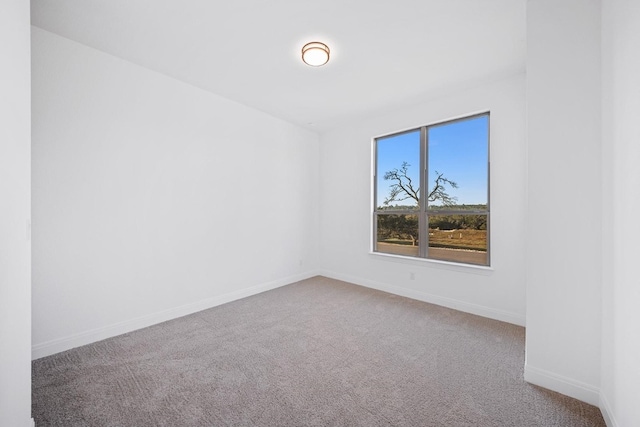 unfurnished room with carpet floors