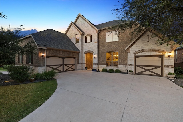 french country inspired facade with a garage