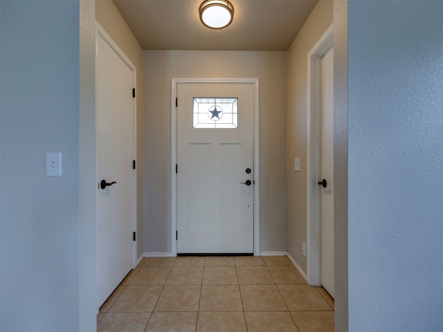 view of tiled foyer entrance