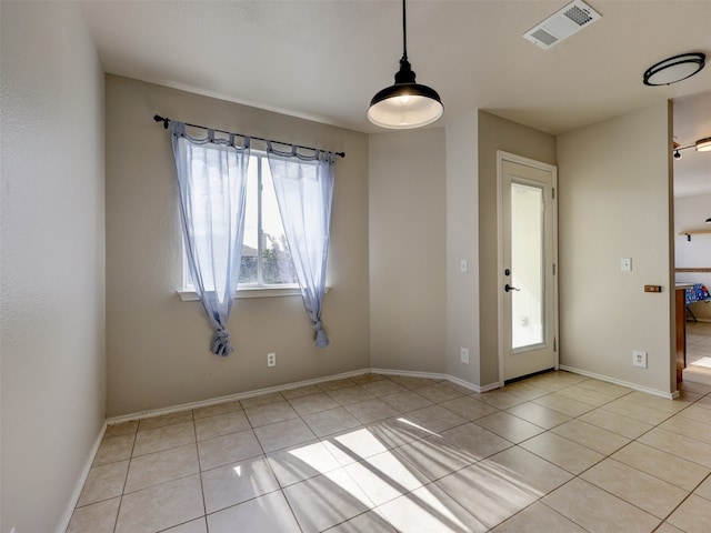 view of tiled spare room