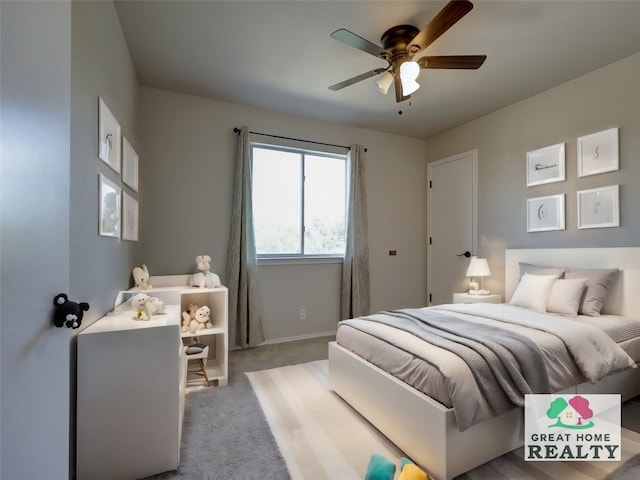 carpeted bedroom featuring ceiling fan