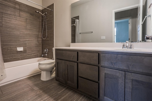 full bathroom with toilet, vanity, and shower / bath combo with shower curtain