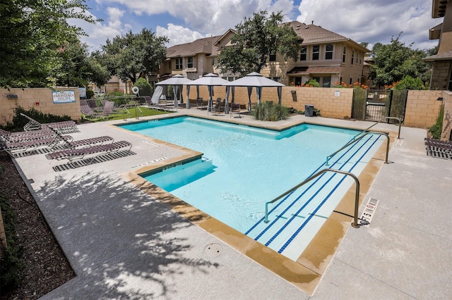 view of pool with a gazebo and a patio area