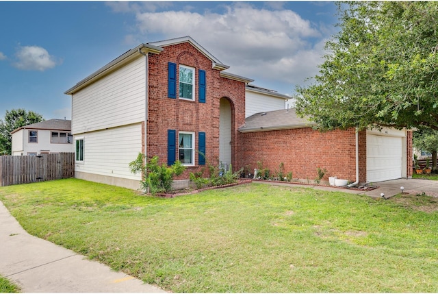 view of front of home with a garage and a front lawn