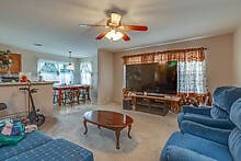 living room featuring ceiling fan