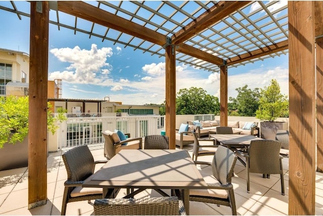 view of patio / terrace featuring outdoor lounge area and a pergola