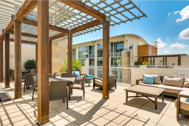 view of patio featuring an outdoor living space and a pergola