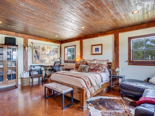 bedroom with wood ceiling and concrete floors