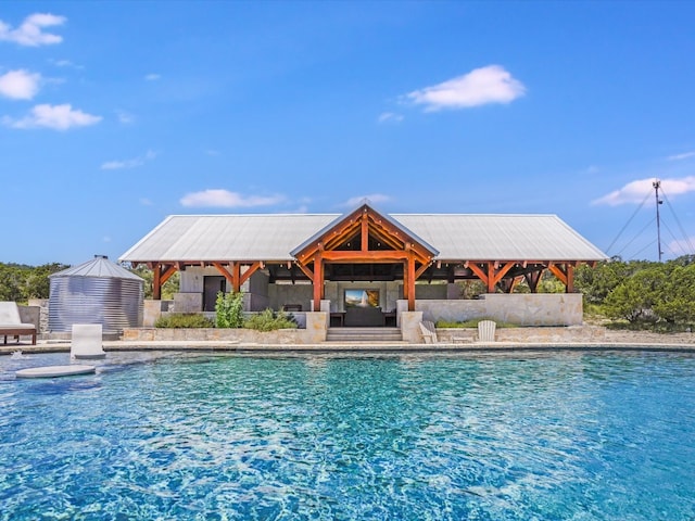 view of swimming pool with a gazebo