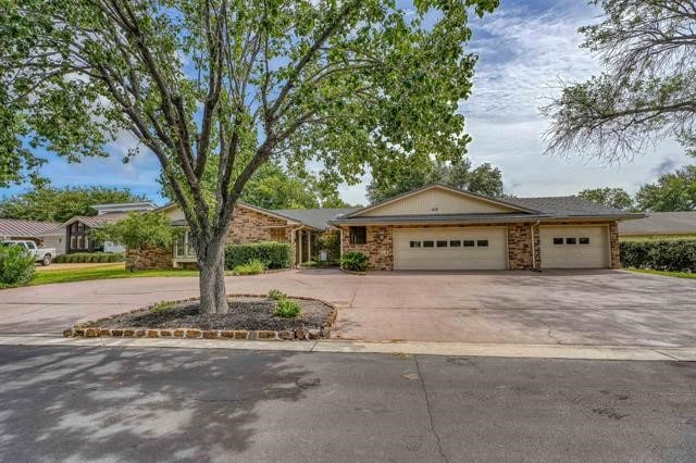 ranch-style house featuring a garage