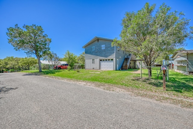 view of side of home with a garage