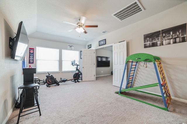 workout area with carpet floors and ceiling fan