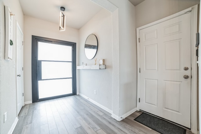 entrance foyer with light hardwood / wood-style floors