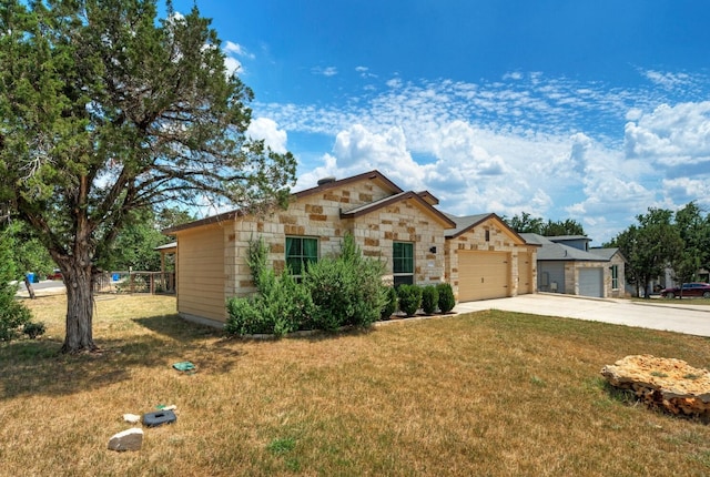 ranch-style house with a garage and a front yard