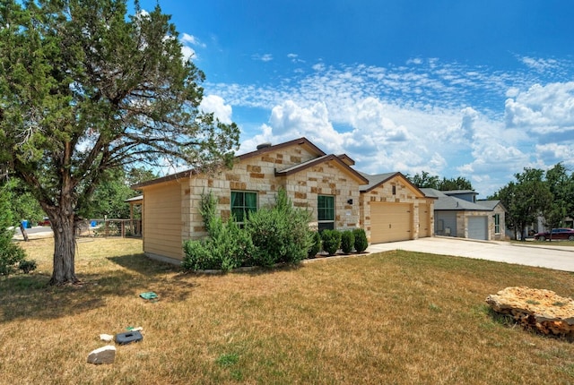21707 Crystal Way, Lago Vista, TX 78645 - view of front of property with driveway, a front yard, an attached garage, and stone siding
