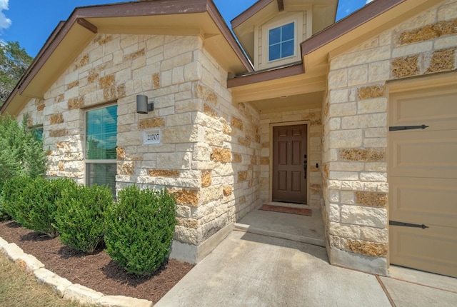 21707 Crystal Way, Lago Vista, TX 78645 - doorway to property featuring stone siding