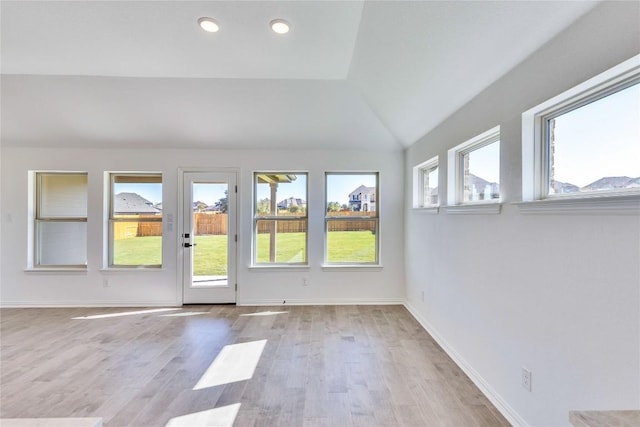 607 Breeze Hollow Ln, Georgetown, TX 78628 - unfurnished room with vaulted ceiling, wood finished floors, and recessed lighting