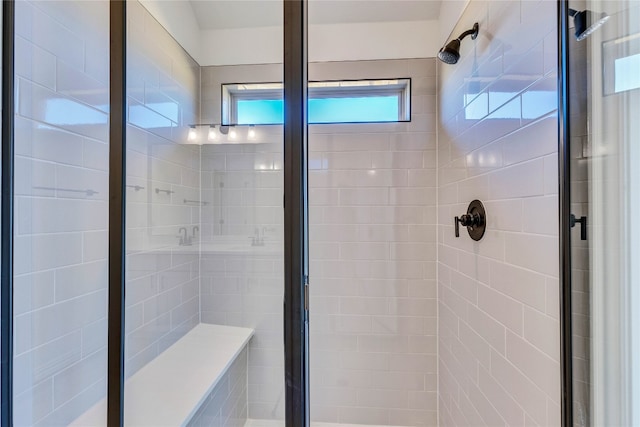 bathroom featuring an enclosed shower