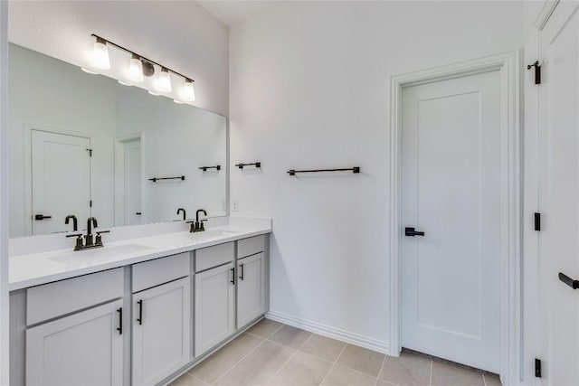 607 Breeze Hollow Ln, Georgetown, TX 78628 - bathroom featuring double vanity and tile patterned floors