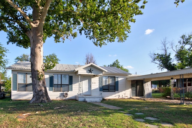 ranch-style house with a front yard