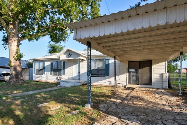 exterior space with a front yard